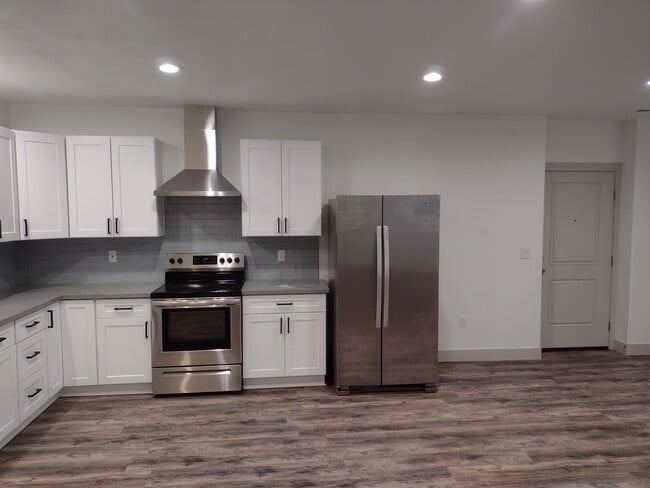 Stove and refrigerator - 6821 S Cook Dr Unit Basement