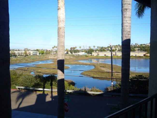 Building Photo - Upgraded Corner Condo with Lagoon View Unit 209