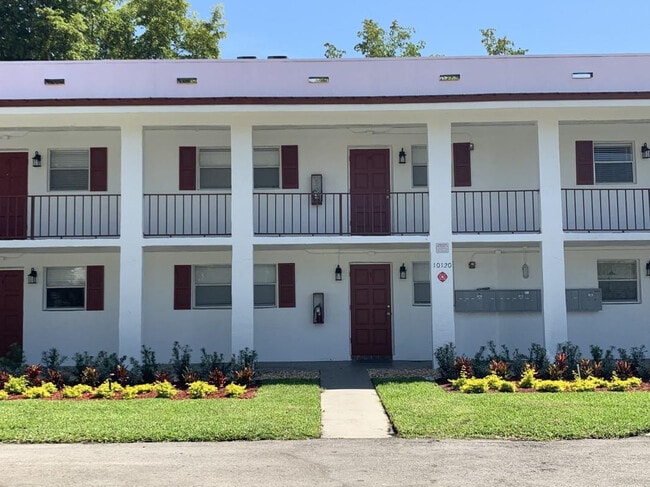 Building Photo - 10120 NW 36th St Unit 12