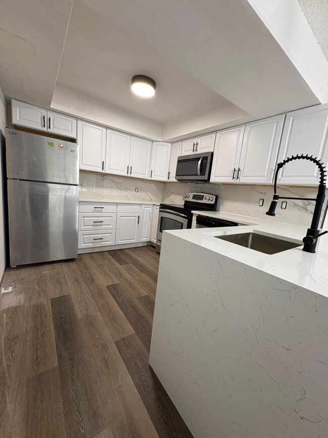 Building Photo - 1150 E Sample Rd Unit 312