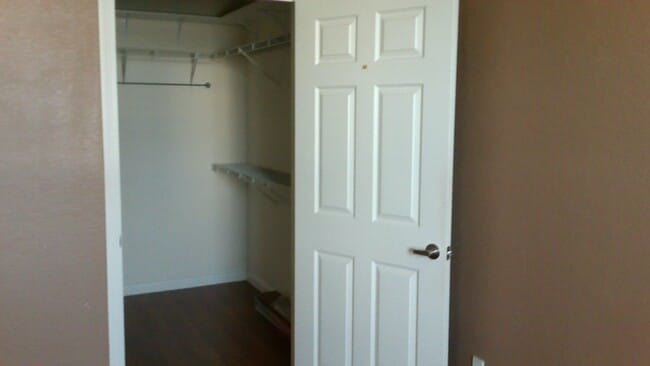 Photo - Beautiful 1/1 corner unit with upgraded wood floors a large balcony with an Orange Avenue view.