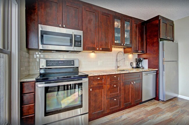 Photo - Mountain side condo! Hot tub! Underground ...