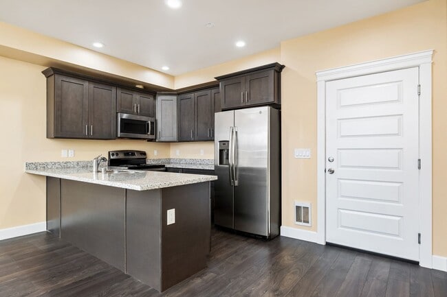 Photo - Marigold Apartments - Make Spirits Bright In Your New Apartment Unit 103