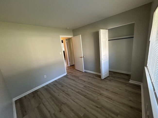 Photo - Charming 3BR Home with Fenced Backyard, Garage & Modern Flooring — 1,322 Sq Ft