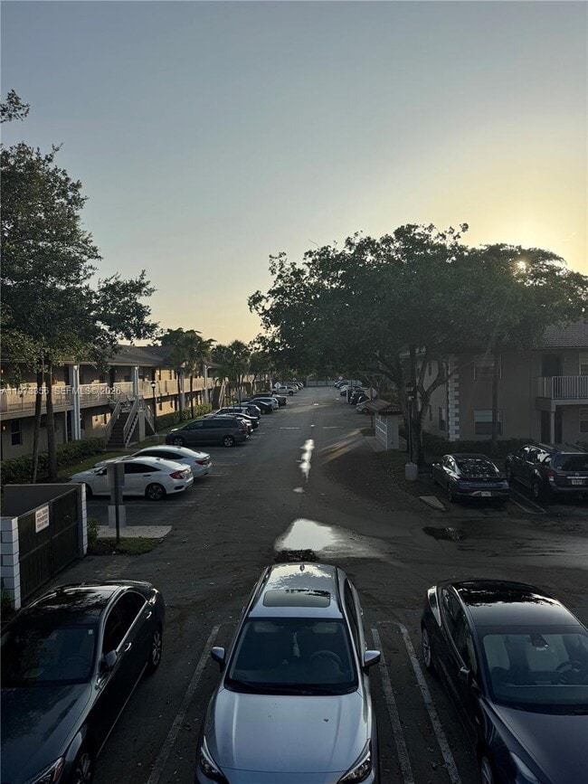 Building Photo - 8750 Royal Palm Blvd Unit 109-3