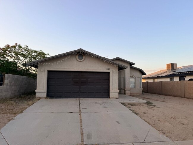 Building Photo - Three Bedroom Home with Two Car Garage and Fenced Lot in San Luis AZ.