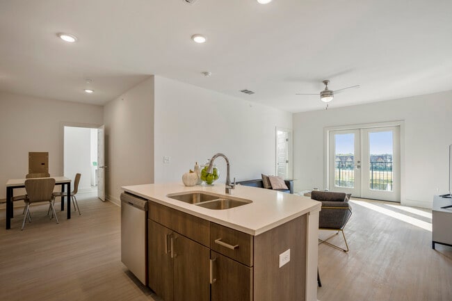 Dining table and chairs included with the Conroe floor plan