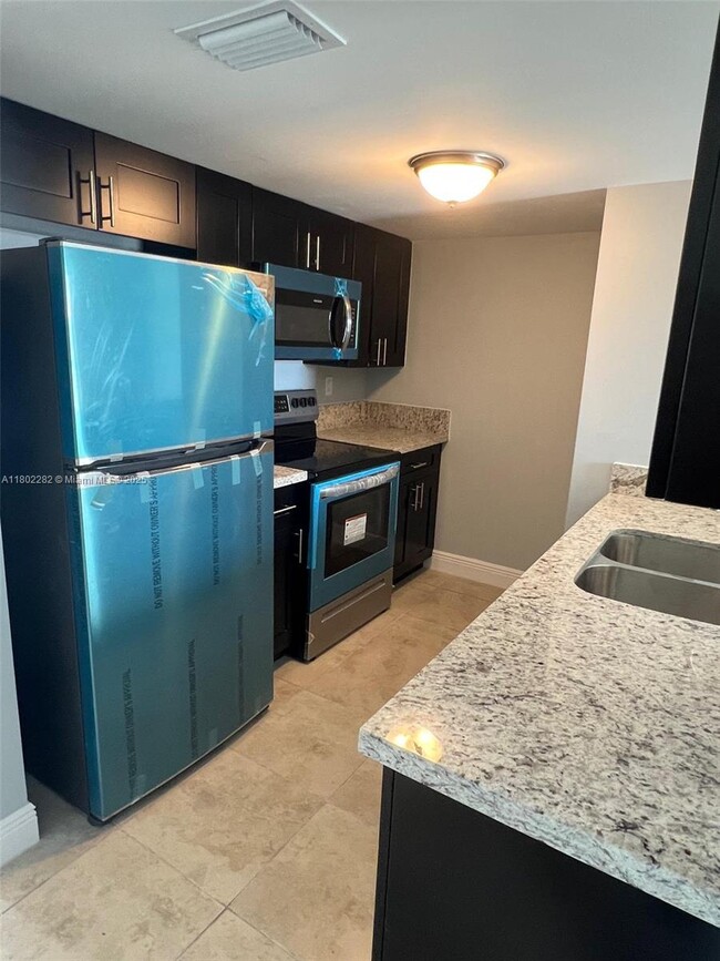Photo - 1955 NW 5th Pl Condo Unit 12