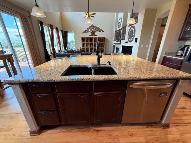 Photo - Luxury Furnished Executive Home with Entertainers Basement, Trex Deck & 3-Car Garage