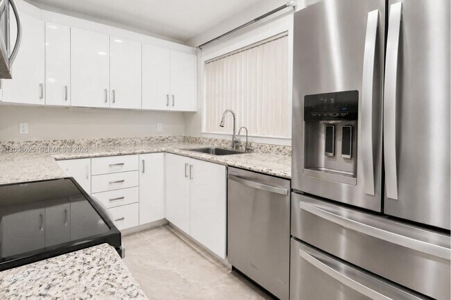 Building Photo - 7745 SW 86th St Unit D-118