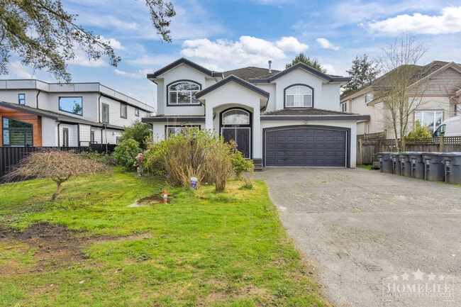 Building Photo - Beautiful 4 Bed 3 Bath Home with Covered Patio in West Newton Surrey Unit Upper House