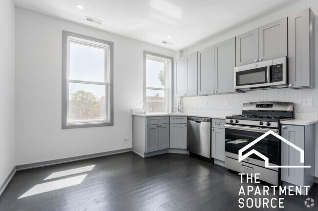 Building Photo - 2814 N Mozart St Unit 2R Rental