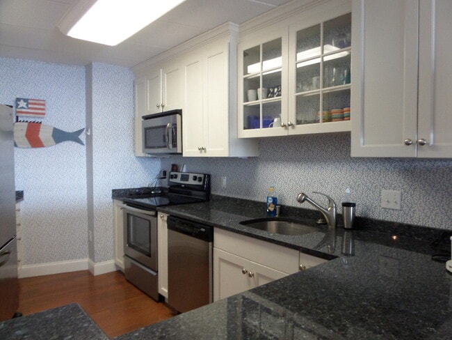 Updated open kitchen - 1315 Capella S Condo Unit 1315