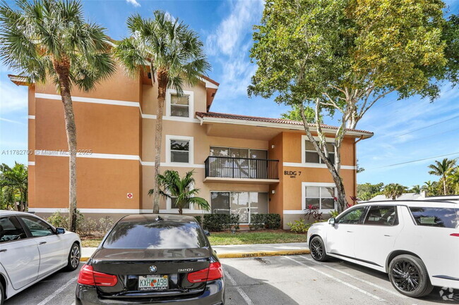 Building Photo - 8891 Wiles Rd Unit 102 Rental