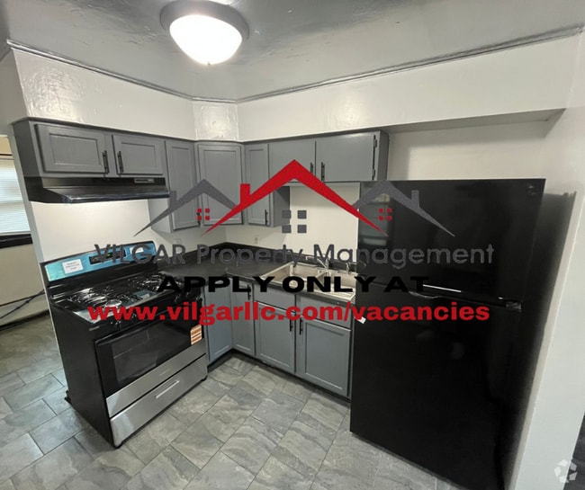 Building Photo - This keen & clean 2 bed / 1 bath ranch-sty... Rental