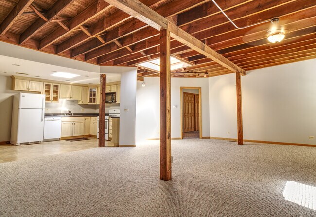 Living room with open kitchen - 112 E Burlington Ave Unit Apartment 1