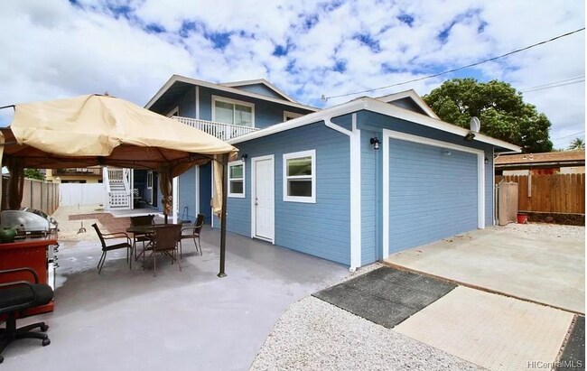 Photo - 6 bed 2 bath, Multi-Family home, Converted Garage and ample storage.