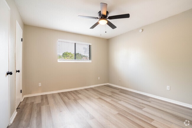 2BR, 1BA - 851SF - Primary Bedroom - Springs of Lake Jackson Apartments