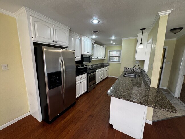 Photo - Stunning home located near Frank Higginbot...