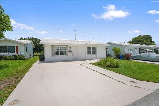 142 NW 10th Ct