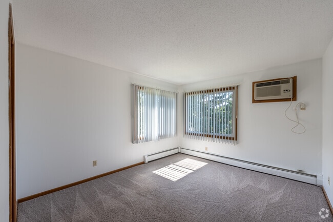 2BR, 1BA - 847SF - B - Primary Bedroom - Surrey Gardens Apartments