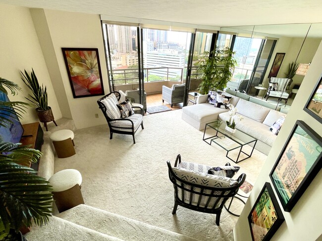 Sunken living room from entryway and dining room