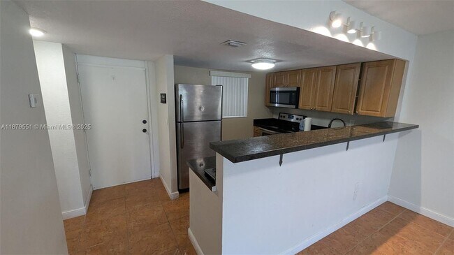 Building Photo - 15600 NW 7th Ave Unit 111 Rental