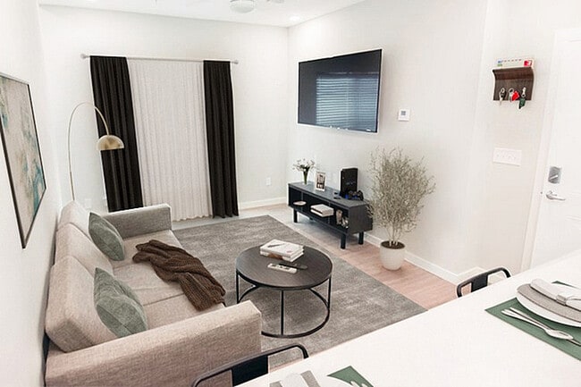 1x1 Townhome Living Room - College Vue on University