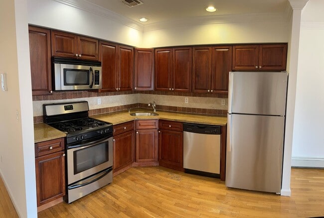 Building Photo - 1831 83rd St Unit 2A