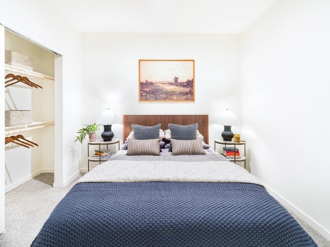 A calming bedroom at Modera University Park, paired with a spacious closet and soft finishes designed for everyday comfort.