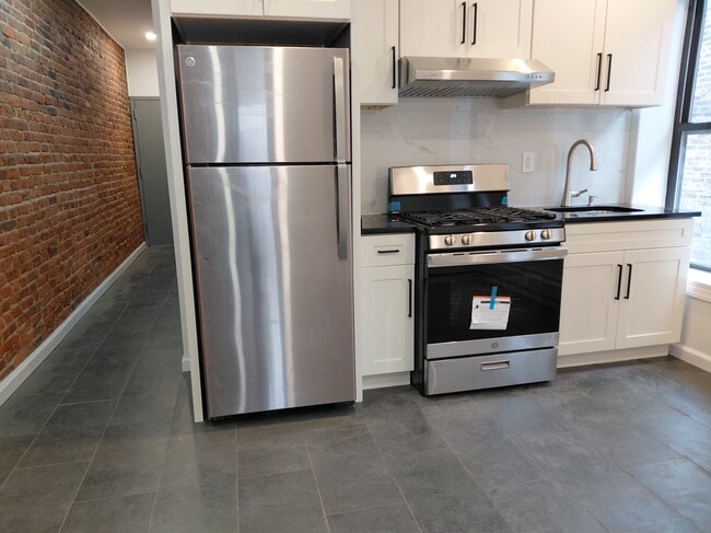 Building Photo - 9611 Church Ave Unit 2R