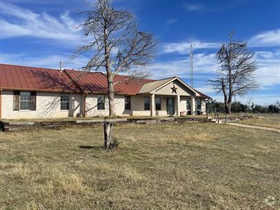 Building Photo - "Charming 3-Bed Oasis on US Highway 87: Sp... Rental