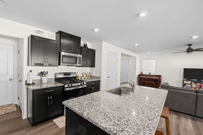 Photo - Beautiful 4-Bedroom Home with Fenced Backyard & Open Floor Plan!