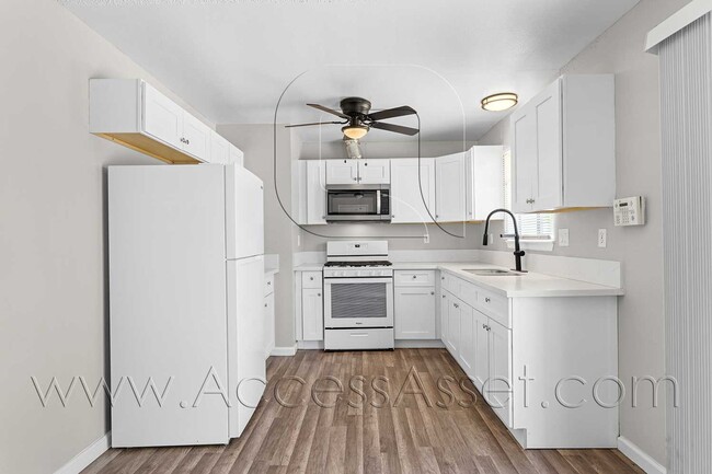 Photo - Single-Story 3BR Home with Garage & Fully Fenced Yard