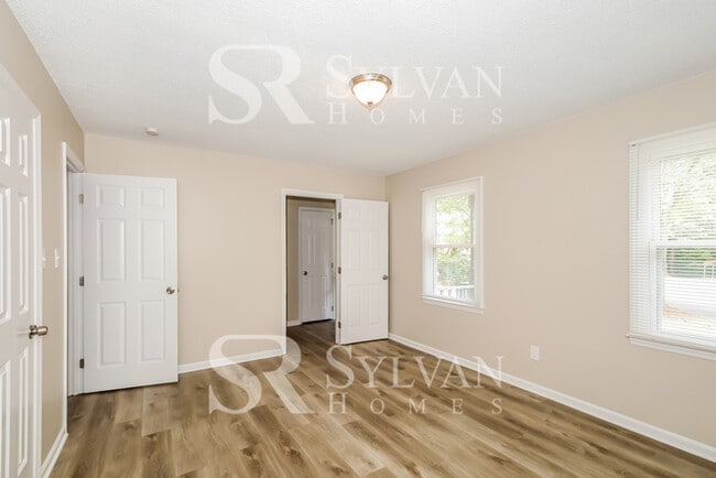 Photo - The living is easy in this 4 bedroom, 2 bathroom home