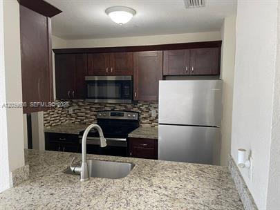 Building Photo - 1471 NW 22nd Ct Unit 2