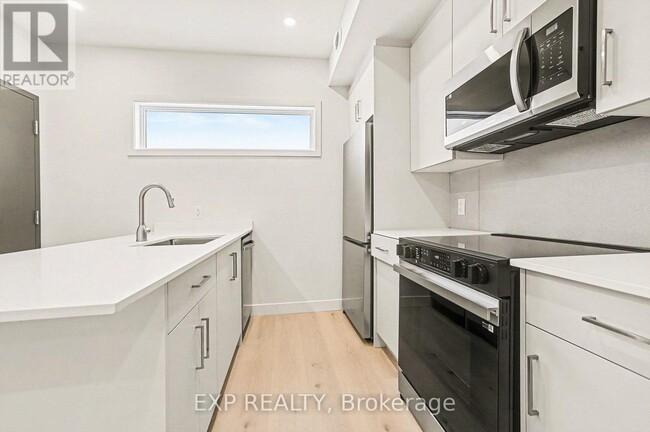 Photo - 79 Marquette Ave Unité 5