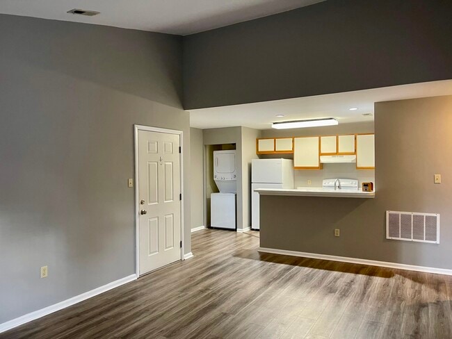 Living Area Lookong Into Kitchen & Eating Area