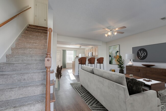 Spacious Living Room with Hardwood Style Flooring