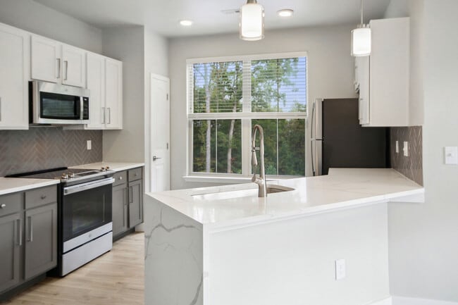 Building Photo - The Apartments at Brayden