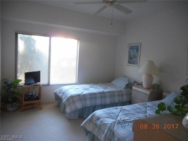 Building Photo - 6770 Pelican Bay Blvd Unit 231
