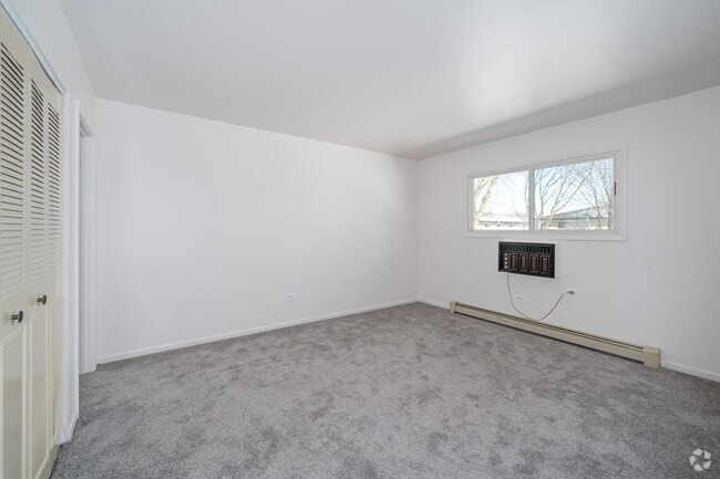 El Deluxe - 2 habitaciones, 1.5 baños - 887 pies cuadrados - Dormitorio principal - Heritage Senior Apartments - 55 and over