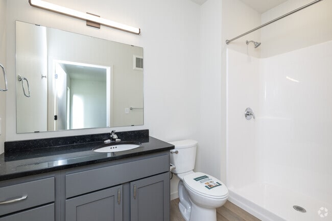 3BR, 2BA - 1,500SF - Primary Bathroom - Riverhouse Apartments