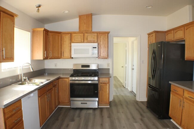 Photo - Move-In Ready 4BR/2BA with New Flooring, F...