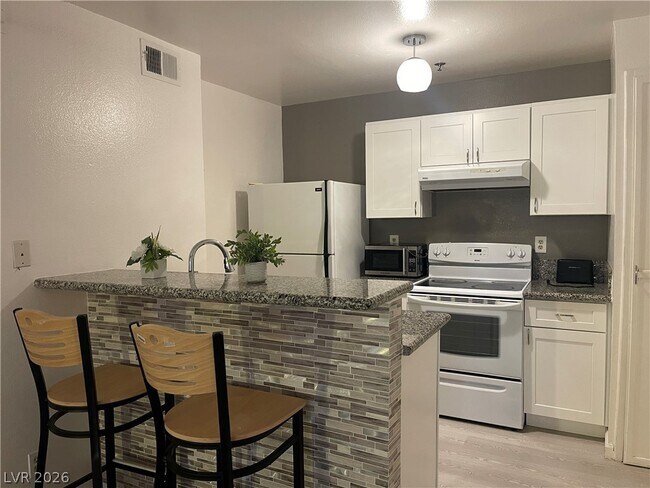 1361 E University Ave. Unit 105
