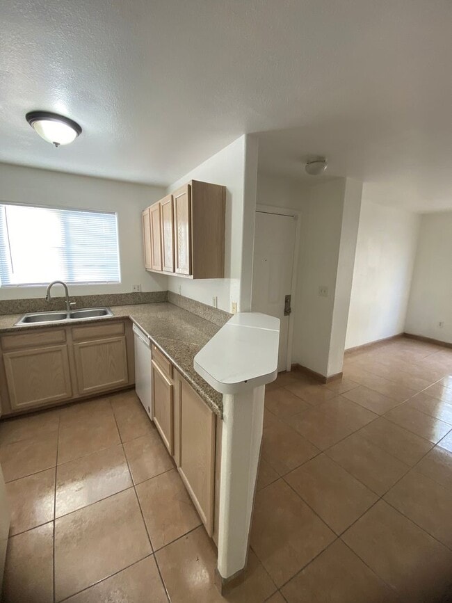 Photo - AMERICANA Property Mgmt - Downstairs 2 bed...