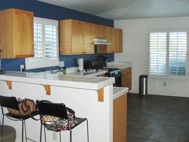 Photo - 1 story home with 2 car garage in a gated community