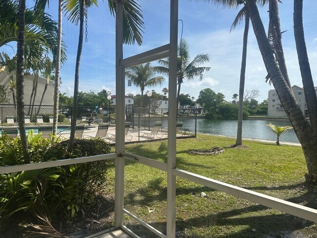 Screened Patio with Lake and Pool Views - 21121 SW 85th Ave Unit The Cove at Cutler Bay
