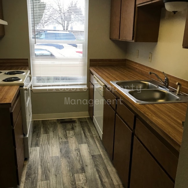 Photo - $1300...2Bed 1.5 Bath, Small Fenced in Covered Patio on Back, Storage