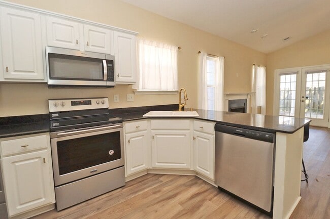 Photo - Fabulous 3 Bedroom home in highly desired community with a lake, pool, and clubhouse! Available M...